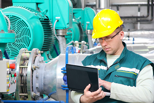 Employee of the company checking a tablet